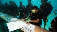 Les Maldives passent la monnaie … en liquide