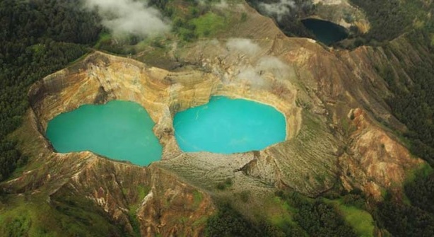 At the top of Kelimutu volcano, these 3 lakes each have a different color